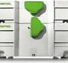 A close-up, front-facing view of stacked white storage containers with green latches. Produktbild-Vorschau