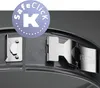 Close-up of a springform pan's latch mechanism and a circular marketing graphic. Náhled obrázku produktu