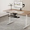 A modern standing desk setup with a monitor, keyboard, and mouse. Voir les images du produit