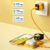 A yellow 3-in-1 charging station with a phone, earbuds, and smartwatch charging, connected to a yellow charger plugged into a wall outlet. Voir les images du produit