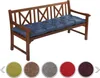 A wooden bench with a blue cushion on it, with color swatches below.