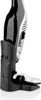 A close-up, side view of a black and silver handheld vacuum cleaner docked in its charging base against a white background. Produktbild-Vorschau
