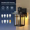 A black outdoor wall lamp with a motion sensor is shown, with various light bulb types displayed on the left side. Dimensions are indicated. Produktbild-Vorschau