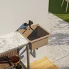 An outdoor sink and countertop setup with a tiled patio and grass in the background. Anteprima dell’immagine prodotto