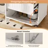 Close-up view of a white kitchen cart with a unique flip-door design, showcasing its metal hinges and the interior storage space. Produktbild-Vorschau