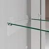 Close-up view of glass shelves mounted on a wall. Náhled obrázku produktu
