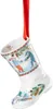 A white porcelain Christmas stocking ornament with a festive winter scene painted on it. Produktbild-Vorschau
