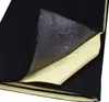 A black sound-dampening mat with a yellow protective backing being peeled away. Produktbild-Vorschau