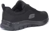A black Skechers shoe is shown from the side against a white background. Voir les images du produit