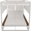 A white outdoor lounge bed with a canopy and cushions. Produktbild-Vorschau