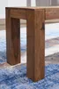 A close-up view of the legs and underside of a wooden bench, placed on a patterned rug. Anteprima dell’immagine prodotto