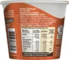 The image shows the side of a food product container with nutritional information and ingredients listed. Produktbild-Vorschau