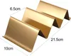 A golden taco holder with dimensions indicated by text. Produktbild-Vorschau
