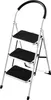 A white, three-step folding stepladder with black anti-slip treads and a black padded handle, shown against a white background. Voir les images du produit