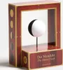A decorative moon clock model displayed on a white background. Produktbild-Vorschau