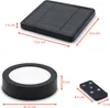The image displays a solar LED light, a round light fixture, and a remote control, with dimensions indicated by measurement lines and text. Produktbild-Vorschau