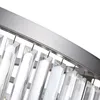 A close-up view of a modern chandelier or pendant light fixture, showing the metallic frame and hanging crystal elements. Produktbild-Vorschau