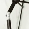 Close-up of the joint mechanism of a brown umbrella pole, with a silver connector. Anteprima dell’immagine prodotto