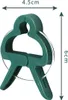 A green plant clip with size dimensions indicated. Produktbild-Vorschau