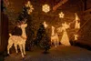 Christmas light decorations in a courtyard setting. Voir les images du produit