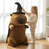 A young girl is interacting with a large plush toy in a room. Náhľad obrázku produktu