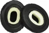Two black headphone ear pads with cream-colored foam padding are shown against a white background. Podgląd zdjęcia produktu