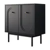 A black cabinet with two doors and gold knobs, standing on four black legs. Produktbild-Vorschau