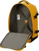 An open yellow backpack is shown from the inside, with straps and a label visible. Produktbild-Vorschau