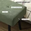 Close-up of a green upholstered bench with descriptive text labels pointing to its features. Produktbild-Vorschau