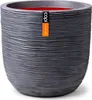 A dark gray textured planter pot with a red interior and an orange tag attached. Voir les images du produit