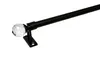 A black metal curtain rod with a clear crystal finial, mounted on a black bracket. Produktbild-Vorschau
