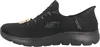 Side view of a black Skechers slip-on shoe. Voir les images du produit