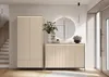 A modern hallway with a wardrobe and a console table, decorated with a mirror and plants. Produktbild-Vorschau