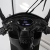Close-up of the dashboard and handlebars of an electric scooter. Produktbild-Vorschau