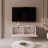 A modern living room with a wall-mounted TV and media console. Voir les images du produit