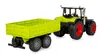 A toy tractor with a trailer, shown from a slight angle on a white background. Produktbild-Vorschau