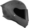 A matte gray motorcycle helmet with a dark visor, shown from the side. Anteprima dell’immagine prodotto