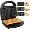 A black waffle maker with interchangeable plates shown with examples of its output, including waffles, sandwiches, and paninis. Voir les images du produit