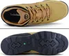 A top-down view and a bottom view of a Timberland hiking shoe. Náhled obrázku produktu