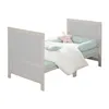 A baby bed with bedding and pillows. Produktbild-Vorschau