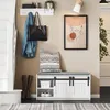 An entryway with a shoe bench, coat rack, and artwork. Náhľad obrázku produktu