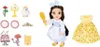 A doll with accessories laid out around it. Produktbild-Vorschau