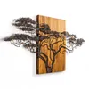 A wall decoration featuring a metal tree silhouette mounted on a wooden panel. Anteprima dell’immagine prodotto