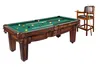A billiard table with several balls and cues, next to a bar stool. Produktbild-Vorschau