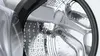 Close-up view of the inside of a washing machine drum. Produktbild-Vorschau