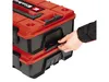 A hand is shown opening a latch on a red and black tool case. Anteprima dell’immagine prodotto