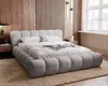A stylish bedroom with a modern upholstered bed. Náhled obrázku produktu