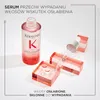 A bottle of Kérastase Genesis serum is displayed with acrylic blocks and a dropper, against a white background. Text overlays describe the product's purpose. Produktbild-Vorschau