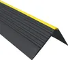 A close-up, angled view of a black and yellow stair nosing profile against a white background. Produktbild-Vorschau