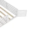 A close-up view of a white bed frame with wooden slats. Náhled obrázku produktu